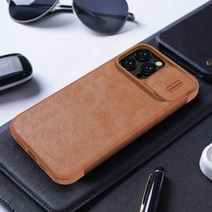 Etui Nillkin Qin Leather Pro Case etui iPhone 14 Pro Max osłona na aparat kabura pokrowiec obudowa z klapką niebieski