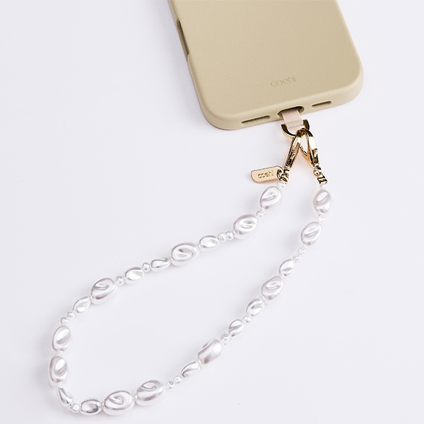 UNIQ Coehl Perla Handstrap uniwersalny   sznurek do telefonu na rękę biały/white pearl