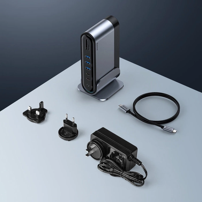 [PO ZWROCIE] HUB Baseus CAHUB-DG0G 3x USB 3.2 Gen 1 / 2x USB-A / 2x USB-C / czytnik kart SD, micro SD / AUX / 3x HDMI / RJ45 PD 100W (wtyczki EU / CN / UK) - szary