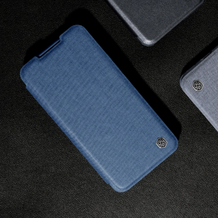Nillkin Qin Cloth Pro Case etui Samsung Galaxy S23 pokrowiec z klapką osłona na aparat niebieskie